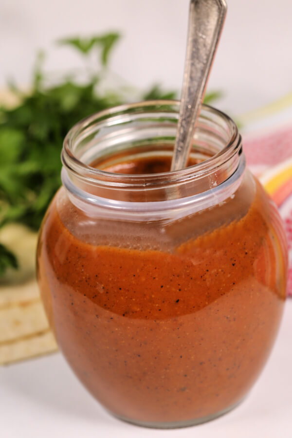 Homemade Substitute for Enchilada Sauce in a glass jar.