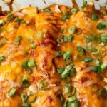Shredded Chicken Enchiladas in closeup.