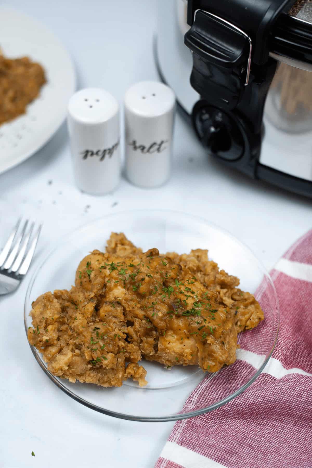 A plate of chicken and stuffing casserole.