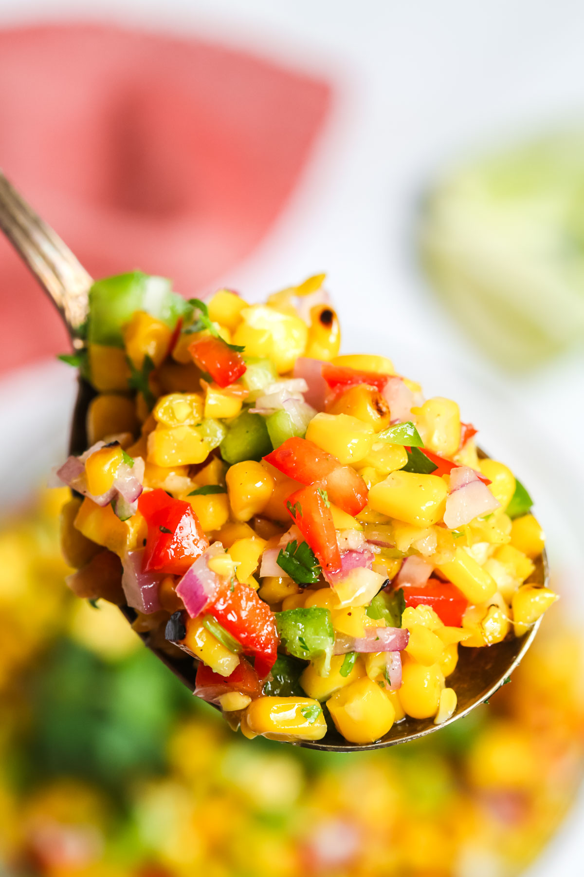 A forkful of Sweet Grilled Corn Salad.