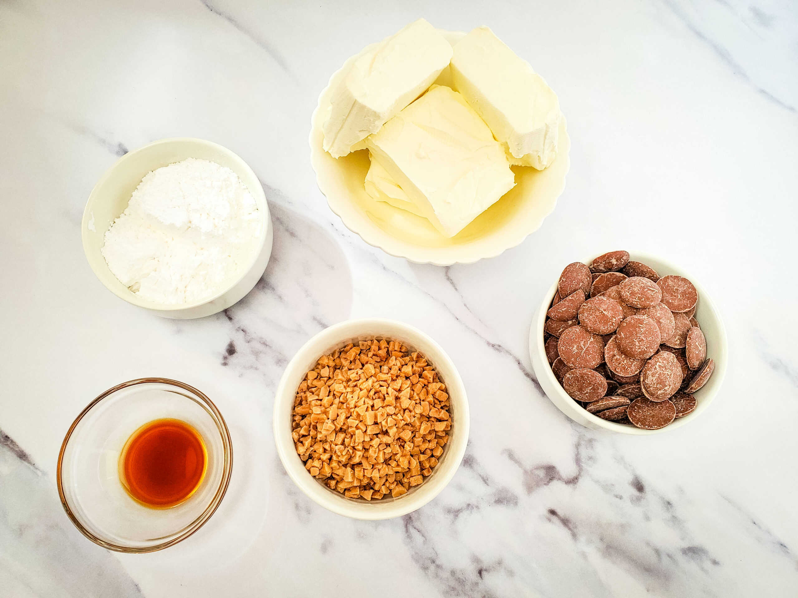 Cream cheese, sugar, toffee bits and chocolate.