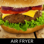 A hamburger with lettuce, cheese, onions, tomatoes, and a sesame seed bun. Text reads: "Savor the deliciousness of a homemade classic with our Air Fryer Hamburger Patties.