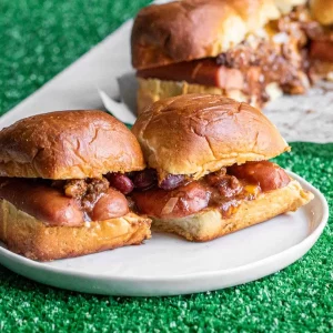 Sliders with hot dogs and chili in them