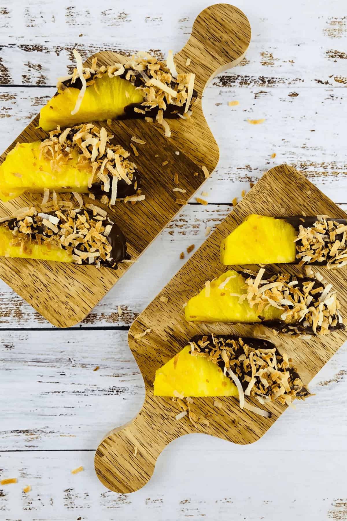 Two small wooden serving boards with the sweet treat on top.