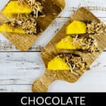 Two wooden boards each hold three pineapple slices dipped in chocolate and sprinkled with toasted coconut flakes. Text at the bottom reads: "Delicious Chocolate Covered Pineapple."
