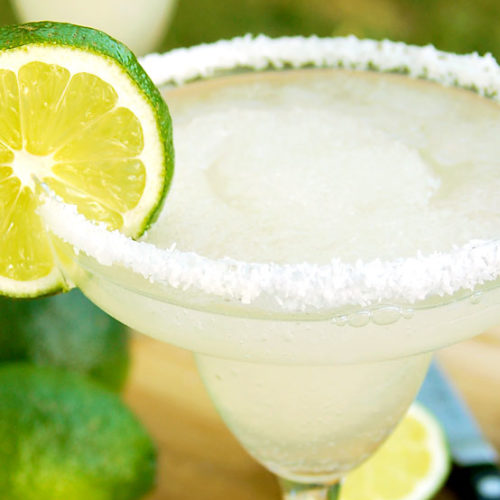 A Frozen Margarita garnished with a lime