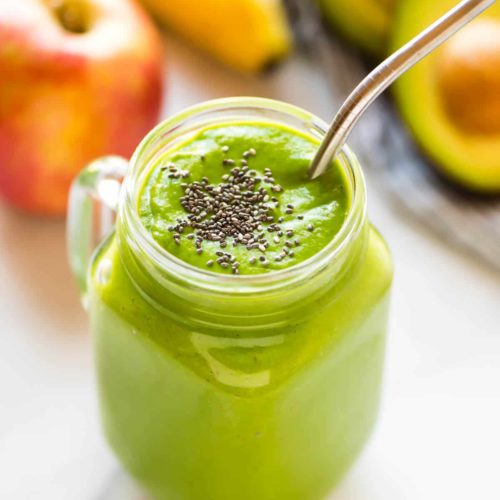 A Cleansing Apple Avocado Smoothie topped with chia seeds