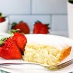 A side view of the dessert with fruit on the side.