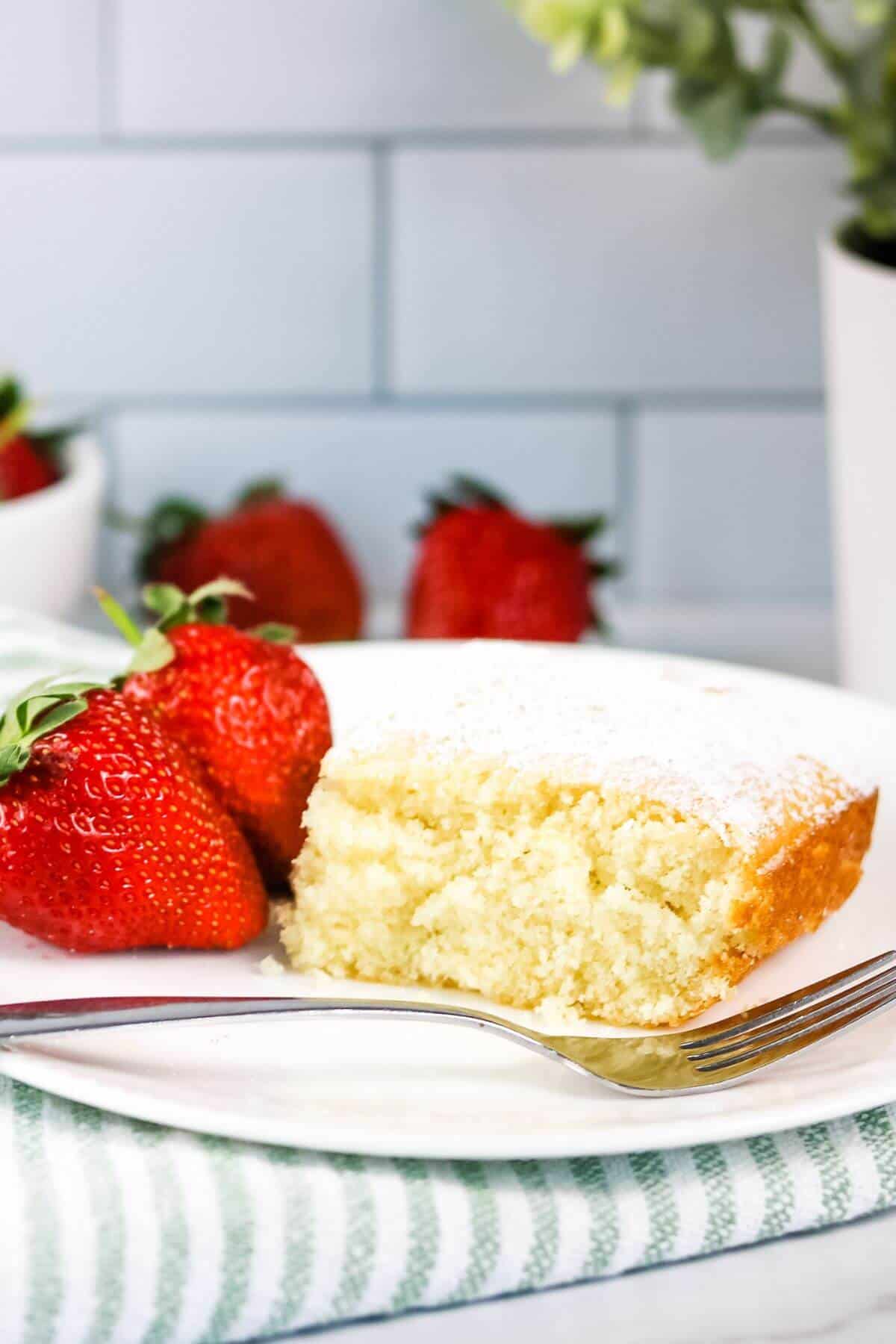 A side view of the dessert with fruit on the side.