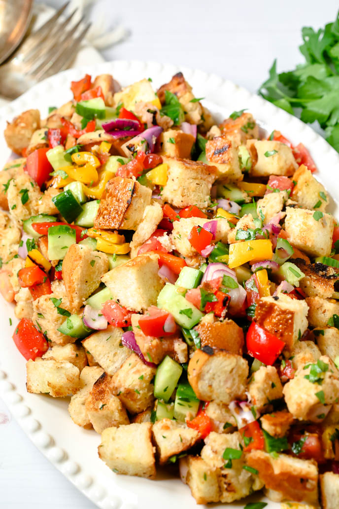 Grilled Panzanella Salad in a white bowl.