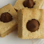 A close up on a plate of the peanut butter cookie bars.