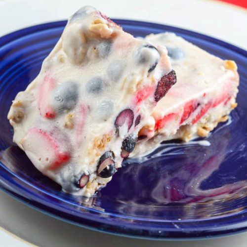 Frozen yogurt bars with strawberries and blueberries