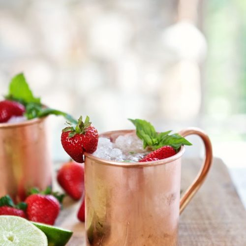 A Strawberry Moscow Mule garnished with strawberries