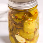 A Mason Jar full of pickles.