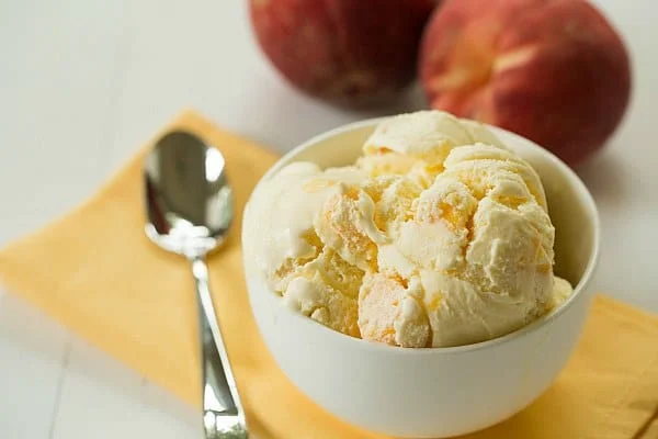 A bowl of fresh peach ice cream