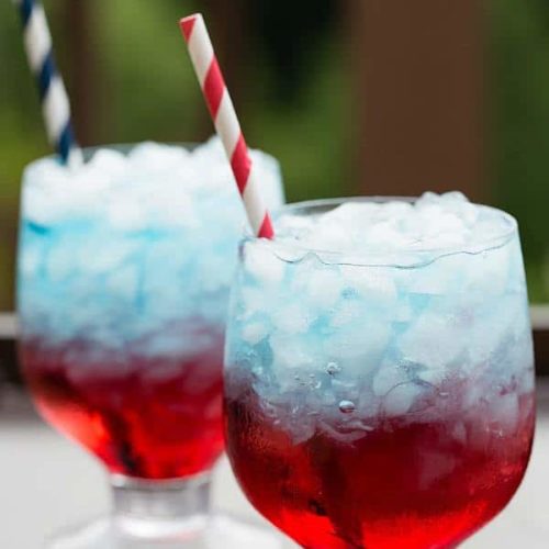 Red white and blue layered drinks with straws