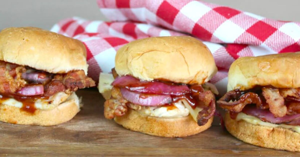 BBQ Chicken Sliders on a wooden cutting board.