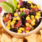 Black Bean Corn Salsa with lime and chips.
