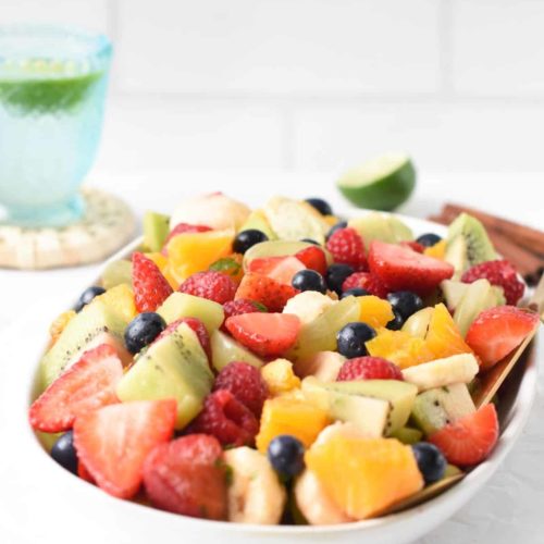 A large bowl is filled with fresh fruits