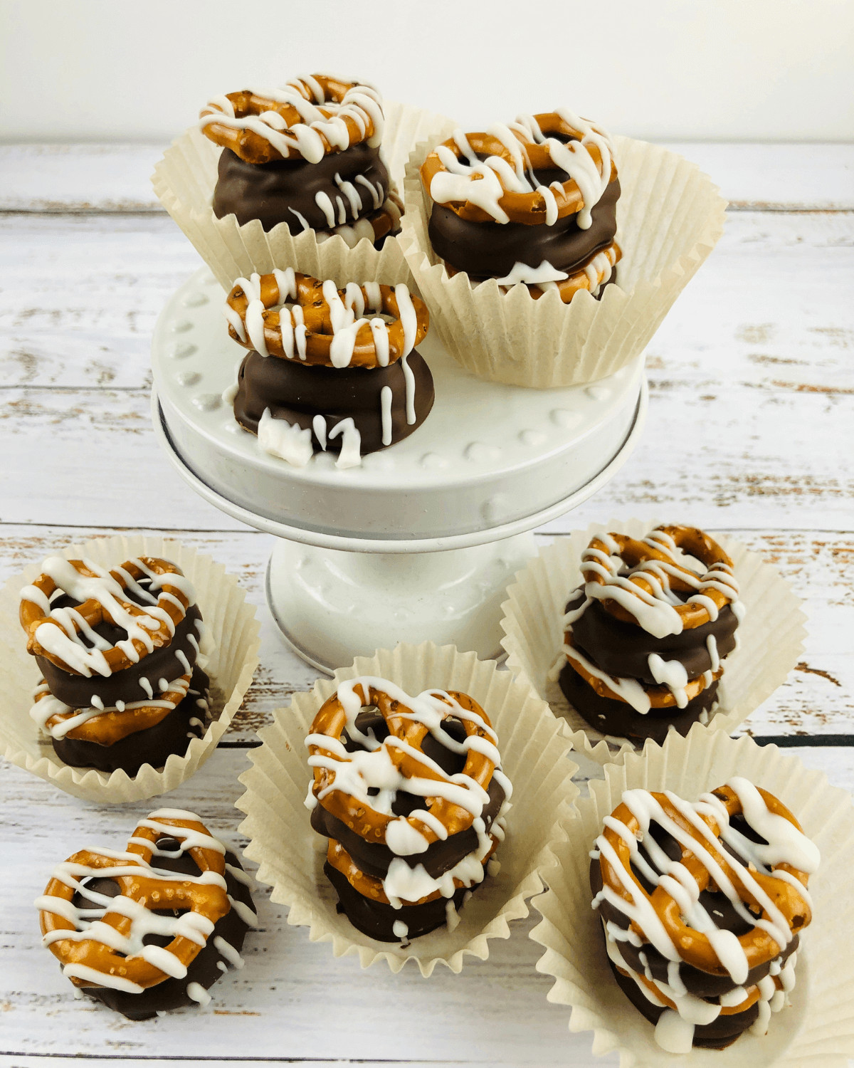 The caramel chocolate pretzels in paper cups.