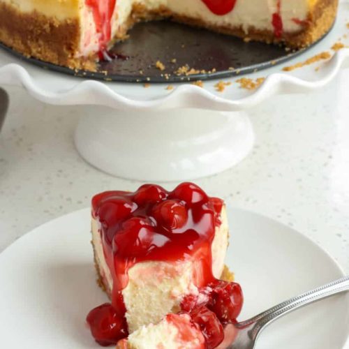 A slice of cherry cheesecake
