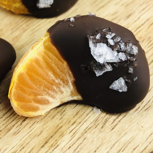 An orange covered in chocolate.