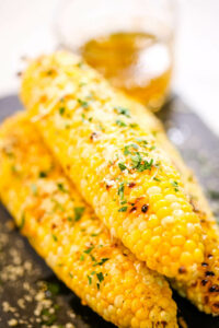 Garlic Parmesan Corn on the Cob stacked up.