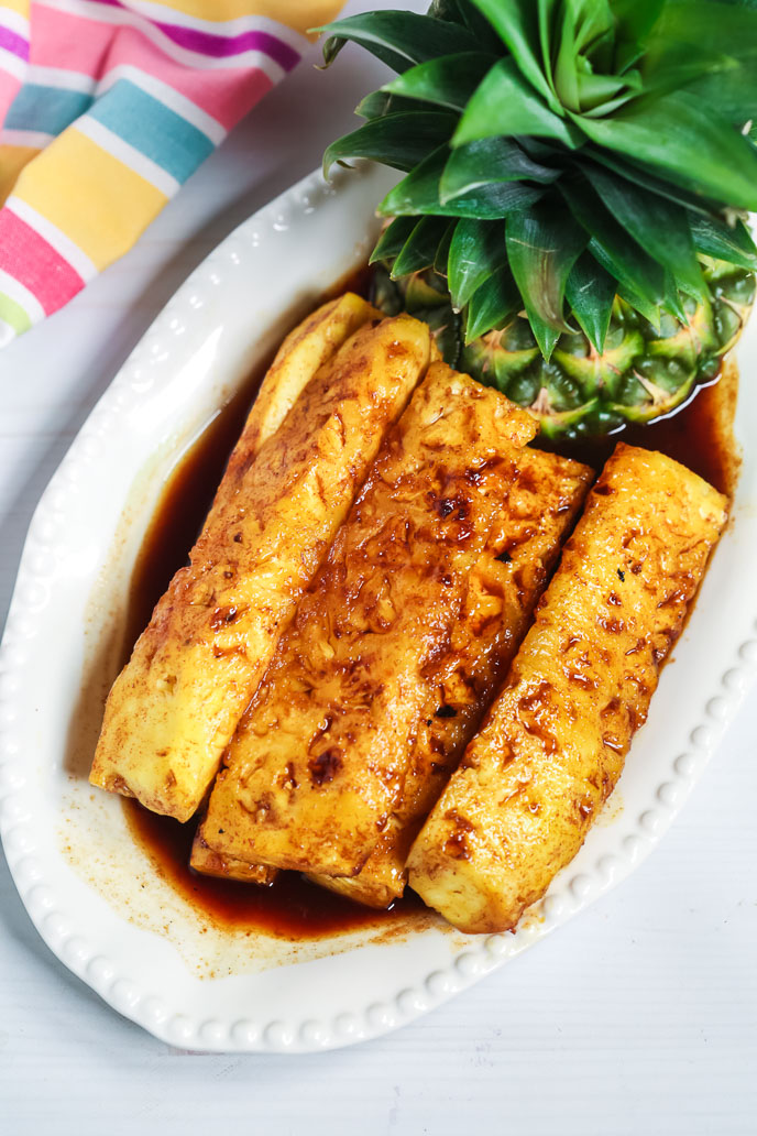 Brazilian Grilled Pineapple on a white plate.