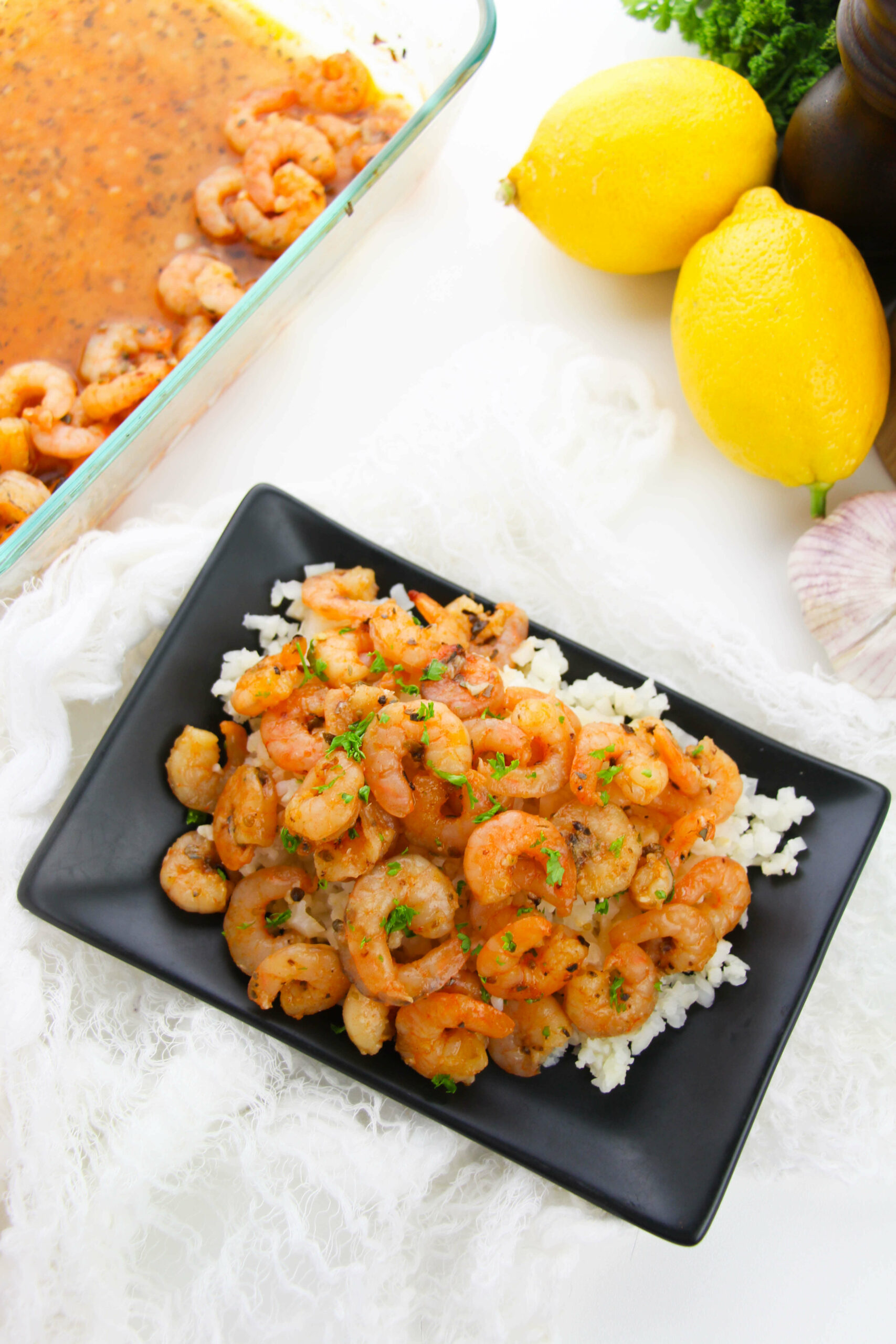A top view of the shrimp, and some lemons.