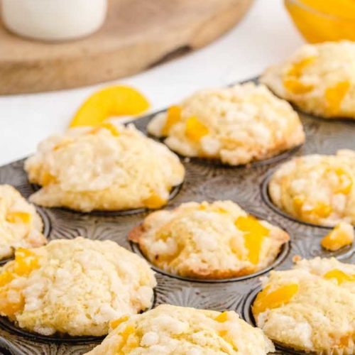 Peach cobbler muffins in muffin tray