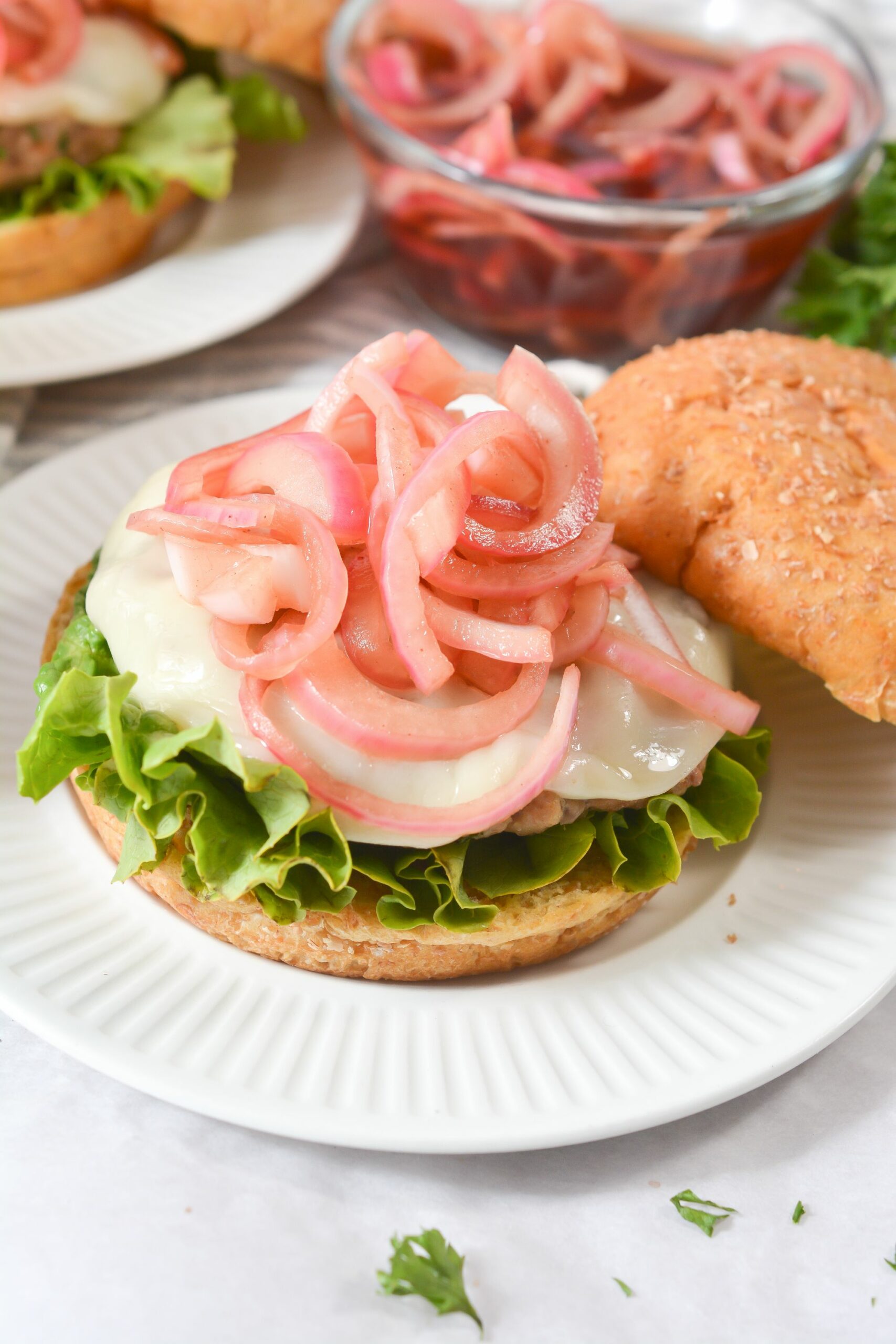 Pickled Pink Onions on a burger.