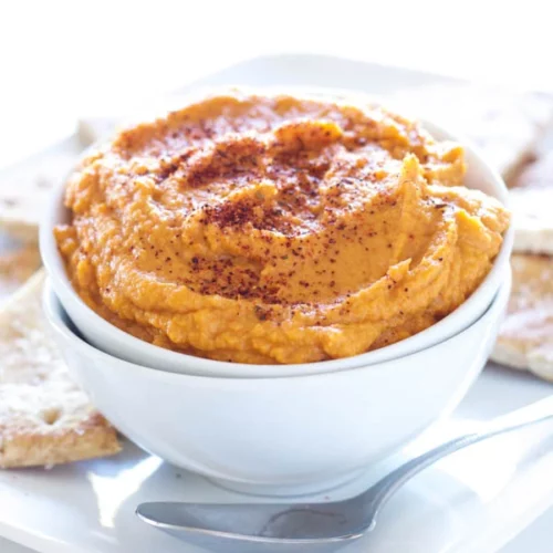sriracha pumpkin hummus in bowl