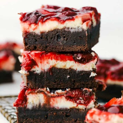 A stack of cherry cheesecake brownies