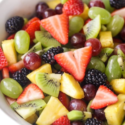 A closeup of a bowl of fresh fruit salad