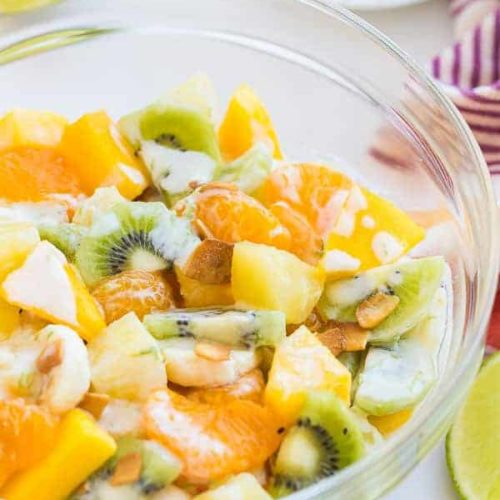 A fruit salad with many tropical fruits