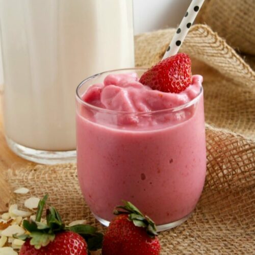 A Healthy Strawberry Milkshake garnished with a strawberry