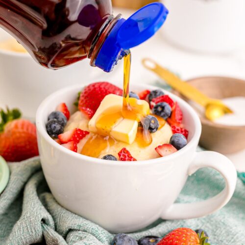 Pancakes in a Mug garnished with fruit