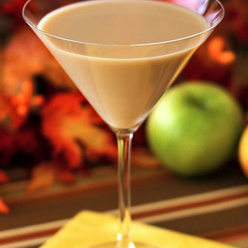 caramel apple pie martini in martini glass