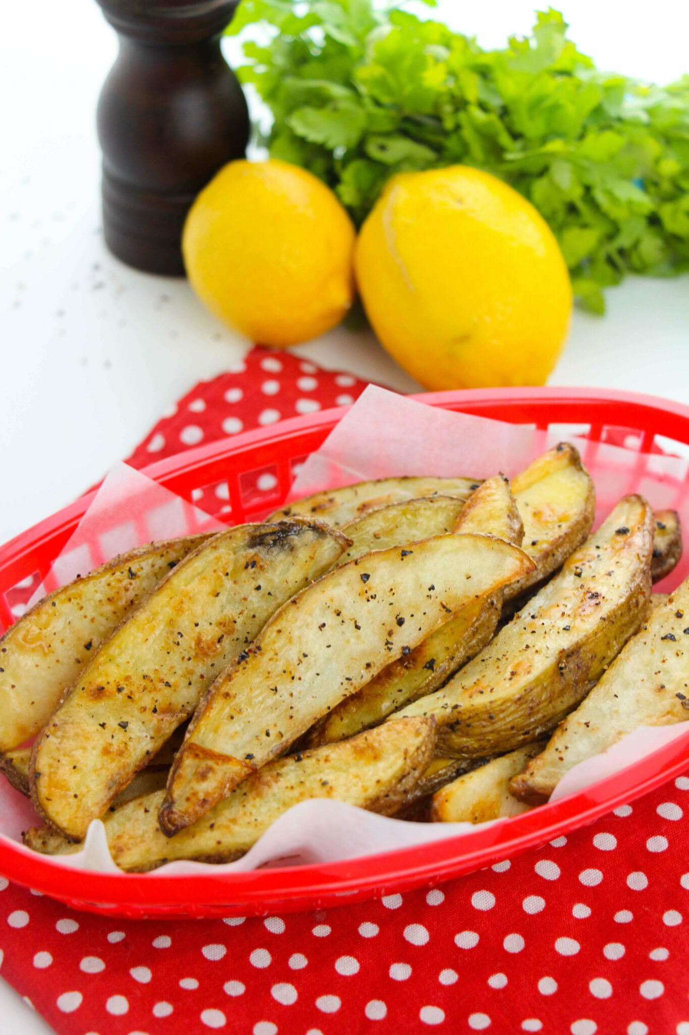 Fries with a side of lemons.