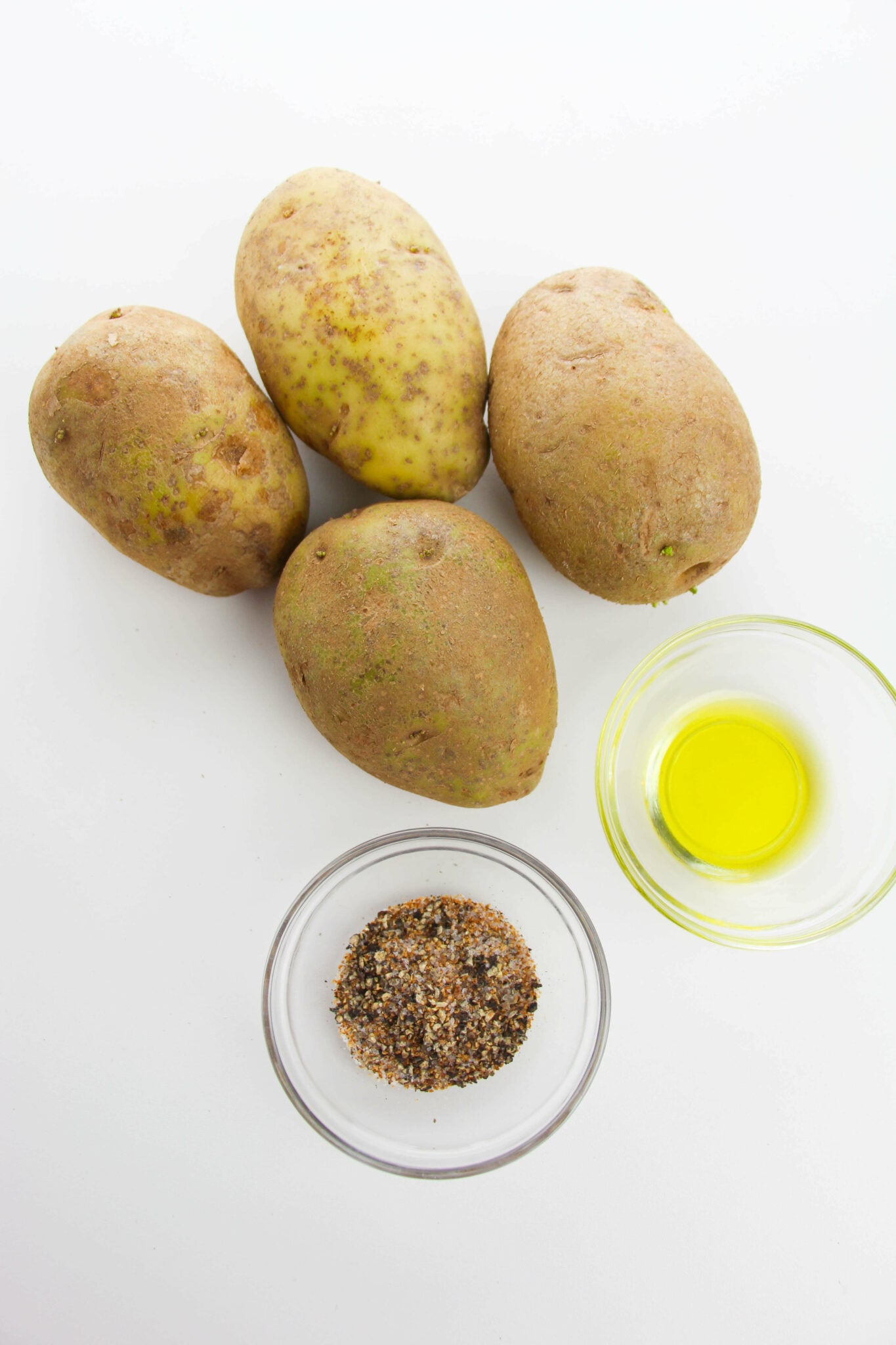 Potatoes, seasoning and oil.