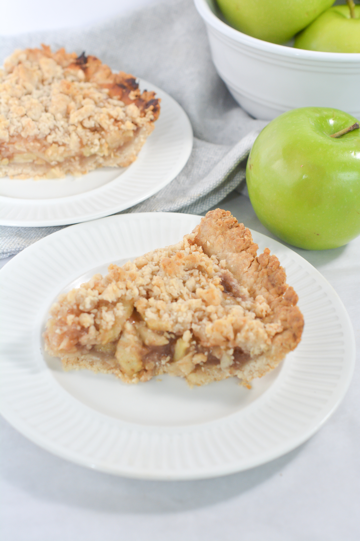 A slice of Easy Apple Pie with Crumb Topping.