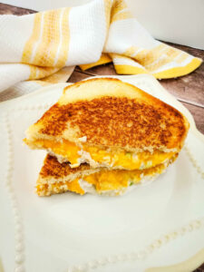 Air Fryer Tuna Melt stacked on a white plate.