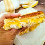 A hand showing the air fryer sandwich.