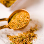 Chicken Rub for Smoking in a measuring spoon.