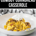 A dish of Cowboy Cornbread Casserole topped with sour cream served on a white plate, with text overlay describing the recipe.