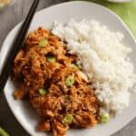 Crock Pot Chicken Teriyaki thighs with rice and chopsticks.