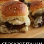Four beef sliders with melted cheese are served on a wooden board. The text below reads, "Beef Sliders: Crockpot Italian Style.
