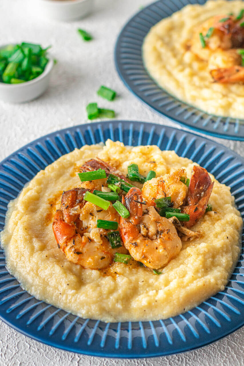 Several dishes of the cajun shrimp and grits.