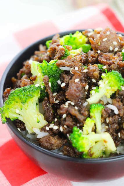 Korean Beef and Broccoli Noodles in a black bowl.