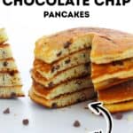 A stack of chocolate chip Cake Mix Pancakes made from muffin mix, with a wedge cut out to show the fluffy texture. Scattered chocolate chips are visible on the surface.